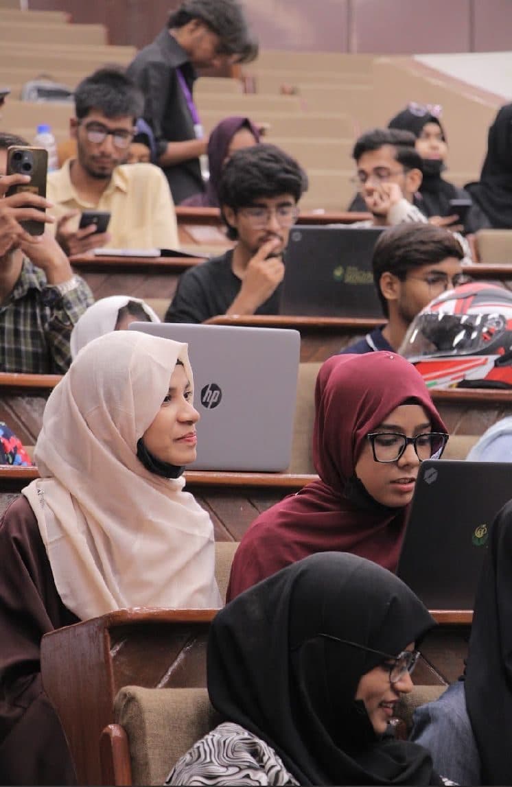 Attendees at their laptops during the Session 6 workshop